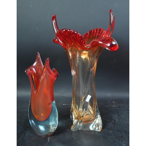 619 - Two vintage retro mid 20th century Murano style glass vases. Each with irregular shaped rims and the... 