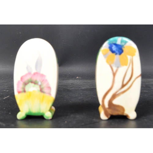 620 - An Art Deco 20th century circa 1930s Clarice Cliff 'Bizarre' pottery cruet set comprising of condime... 