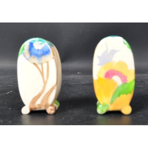 620 - An Art Deco 20th century circa 1930s Clarice Cliff 'Bizarre' pottery cruet set comprising of condime... 