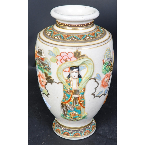 621 - A vintage 20th century circa. 1930's Japanese vase. The vase having hand painted figural details wit... 