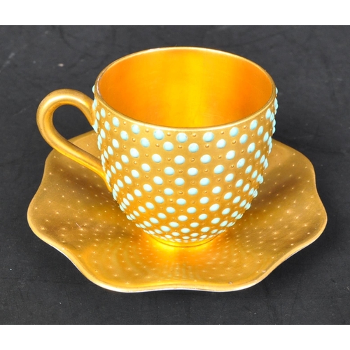 625A - A Victorian late 19th century Coalport porcelain coffee cup & saucer. The coffee cup having a gilt g... 