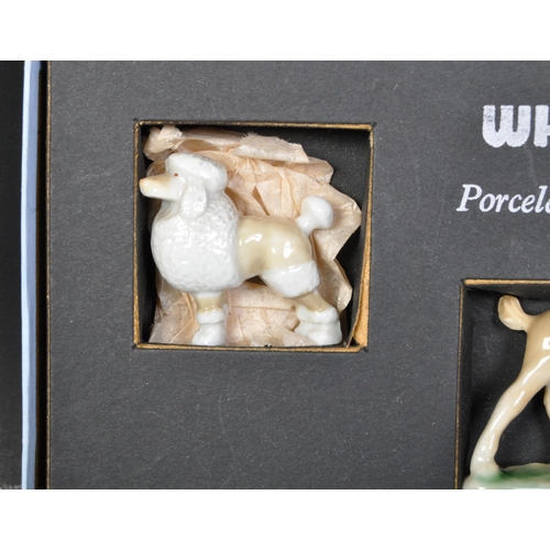 629A - A vintage mid 20th century Whimsies by 'Wade' porcelain. The assortment of five animal figurines in ... 