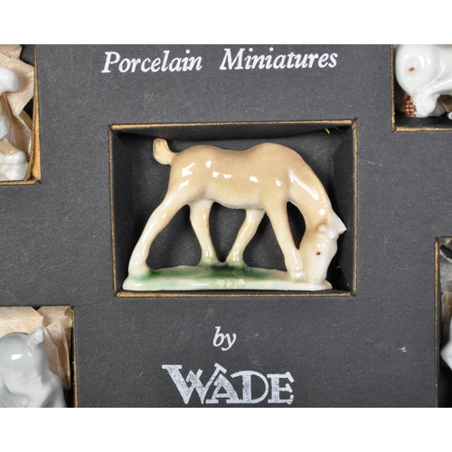 629A - A vintage mid 20th century Whimsies by 'Wade' porcelain. The assortment of five animal figurines in ... 