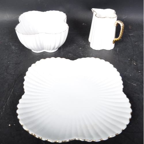 647 - A Victorian 19th century bone china tea service comprising of teacups, saucers, side plates (trios),... 