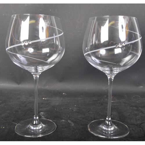 649 - Portmeirion hand crafted glassware. In a display box with brand on front, two large wine drinking gl... 