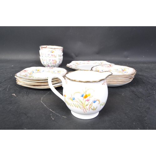 652 - A Royal Albert porcelain tea service comprising of cups, saucers, plates etc. Stamped to underside. ... 