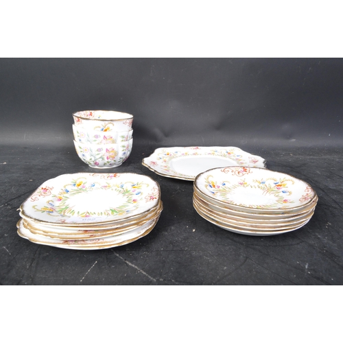 652 - A Royal Albert porcelain tea service comprising of cups, saucers, plates etc. Stamped to underside. ... 