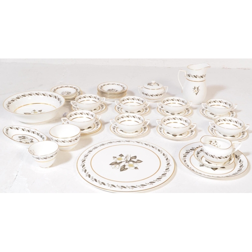 660a - A Royal Worcester porcelain  Bernina pattern tea service comprising cups, saucers, plates and other ... 