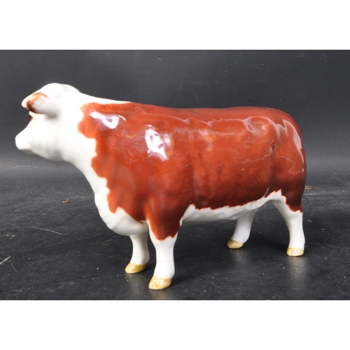 663 - A vintage 20th century Beswick ceramic Hereford cow CH of Champion n. 1360. Marked to base. Some cra... 