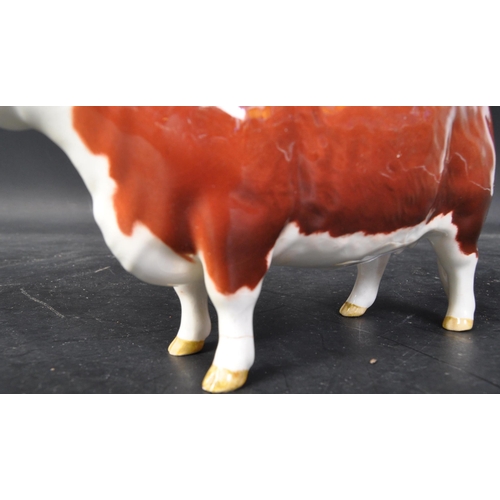 663 - A vintage 20th century Beswick ceramic Hereford cow CH of Champion n. 1360. Marked to base. Some cra... 