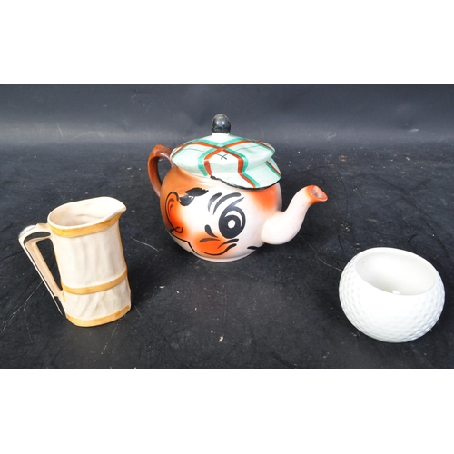 668 - Wade - A vintage 20th century circa. 1950's Wade novelty ceramic Andy Capp Golfer teapot together wi... 