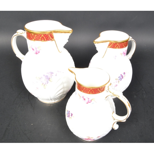 670A - A set of 3 Coalport graduating jugs  - Caughley Mask Head jugs, the originals being produced about 1... 