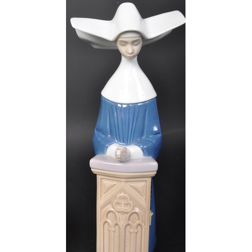 675 - A group of three vintage 20th Century circa 1980s Lladro hand made Spanish ceramic Nun figurines. Se... 