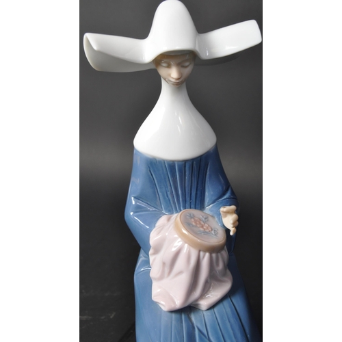 675 - A group of three vintage 20th Century circa 1980s Lladro hand made Spanish ceramic Nun figurines. Se... 