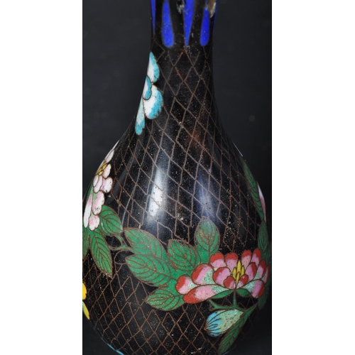 677 - A pair of vintage 20th Century Japanese Cloisonné vases. Having a small rim tapering neck into a rou... 