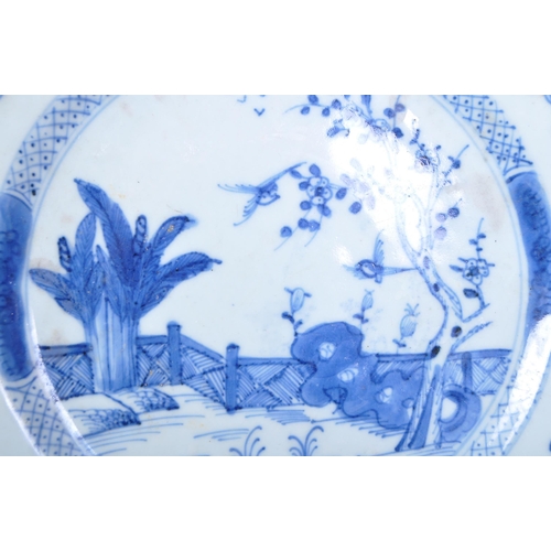 678 - A 19th century Chinese blue and white porcelain plate being hand painted with rural scene featuring ... 