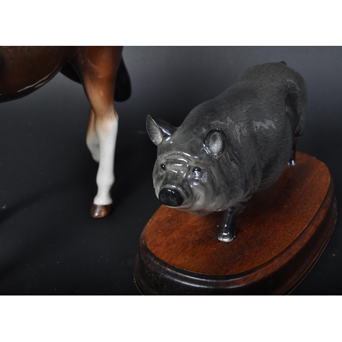 682 - A collection of vintage 20th century china animal figures to include a Royal Doulton pig figure on w... 