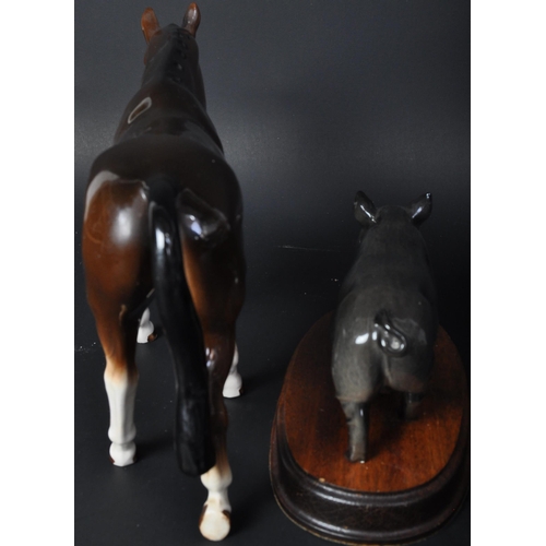 682 - A collection of vintage 20th century china animal figures to include a Royal Doulton pig figure on w... 