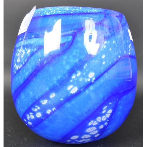 685A - A vintage 20th Century signed studio art glass vase. In blue colourway with a bulbous body. Signed W... 