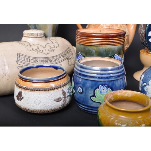 689 - An assortment of early 20th century Royal Doulton Lambeth pottery ceramics items. The lot to include... 