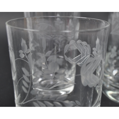 699 - A vintage 20th Century acid etched lemonade decanter drinking glass set. Comprising of a decanter ju... 