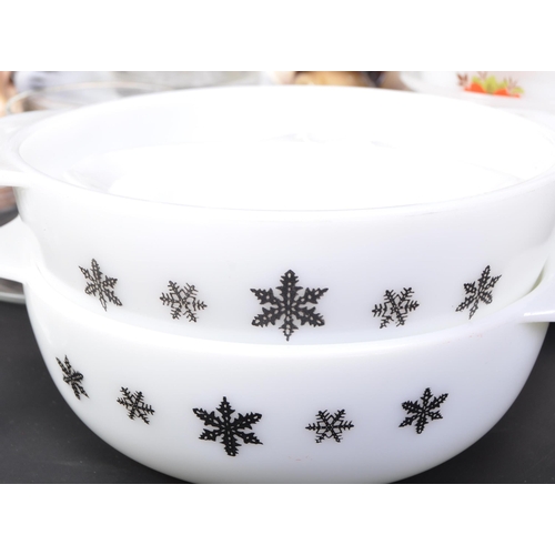 706 - A large collection of kitchen ware 20th Century vintage Pyrex snowflake dinner service, including; d... 