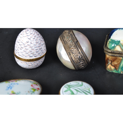 735 - An assortment of nine 19th century & later porcelain and enamel pill boxes to include makers such as... 