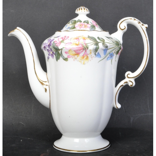 745 - A vintage 20th century bone china Royal Albert tea service in the Country Lane. The service comprisi... 