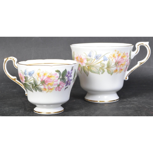 745 - A vintage 20th century bone china Royal Albert tea service in the Country Lane. The service comprisi... 