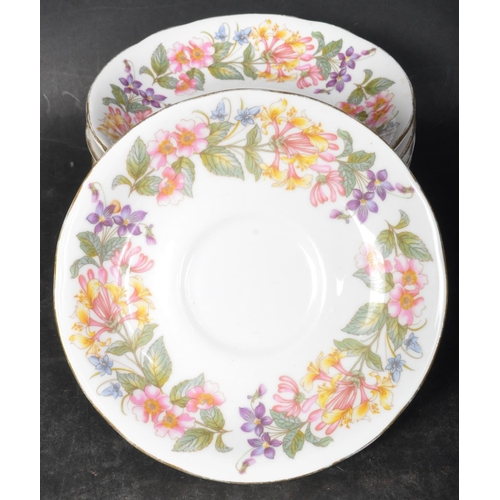 745 - A vintage 20th century bone china Royal Albert tea service in the Country Lane. The service comprisi... 