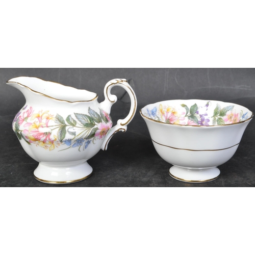 745 - A vintage 20th century bone china Royal Albert tea service in the Country Lane. The service comprisi... 