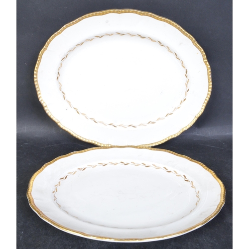 747 - A Bristol Pottery early 20th century porcelain dinner service with cream ground and gilded colourway... 