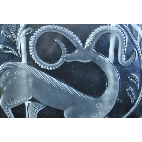 753 - A 1968 Lalique Christmas plate of circular form decorated with scene of gazelle. Engraved Lalique Fr... 