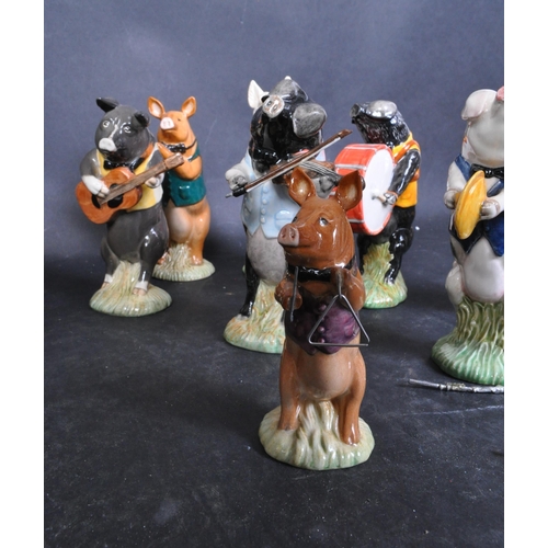 754A - A collection of eight Beswick Pig Prom porcelain figurines to include Matthew, Daniel, Christopher, ... 