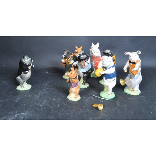 754A - A collection of eight Beswick Pig Prom porcelain figurines to include Matthew, Daniel, Christopher, ... 