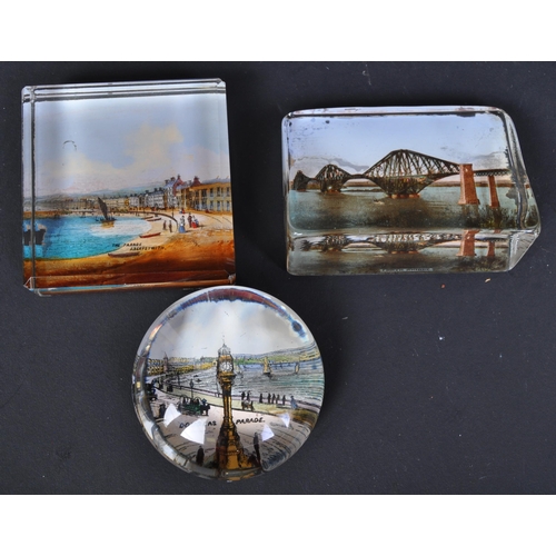 766 - A collection of vintage 20th Century glass tourist place paperweights. To include, Forth bridge, Lla... 