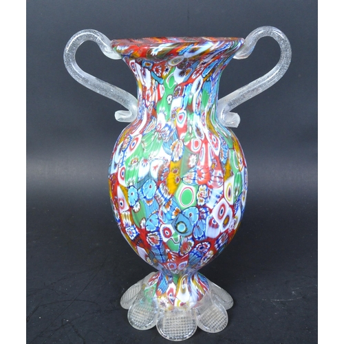 774 - A vintage retro mid 20th century millefiori glass Murano Italian style twin handled vase. The vase h... 