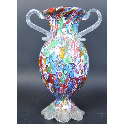 774 - A vintage retro mid 20th century millefiori glass Murano Italian style twin handled vase. The vase h... 