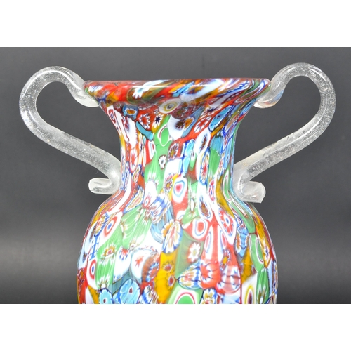 774 - A vintage retro mid 20th century millefiori glass Murano Italian style twin handled vase. The vase h... 