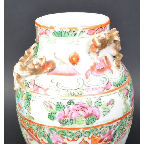 779 - A 19th century Cantonese Chinese vase having hand painted details depicting vignettes with florals a... 