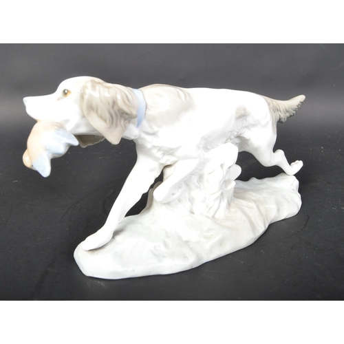 780 - Lladro - Hand made Spanish porcelain figurine statue of a Spaniel retriever hunting dog. In walking ... 