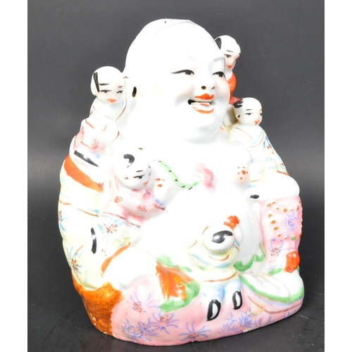 783 - An early 20th century circa. 1930's republic period Chinese laughing fertility Hotei buddha figure d... 