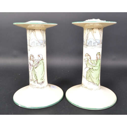 786 - A pair of Royal Doulton series ware ceramic large candle stick holders. (af) Having a lipped top, ha... 