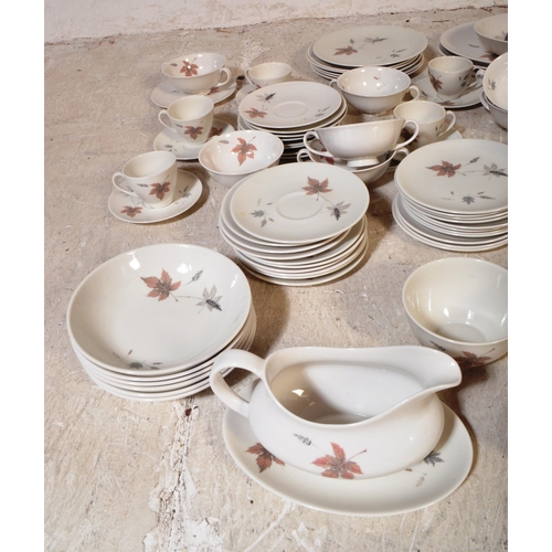 793 - An extensive vintage 20th century Royal Doulton bone china tea and dinner service in the Tumbling Le... 