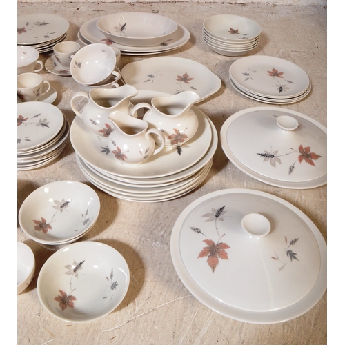 793 - An extensive vintage 20th century Royal Doulton bone china tea and dinner service in the Tumbling Le... 