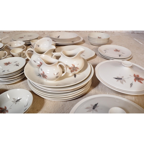 793 - An extensive vintage 20th century Royal Doulton bone china tea and dinner service in the Tumbling Le... 