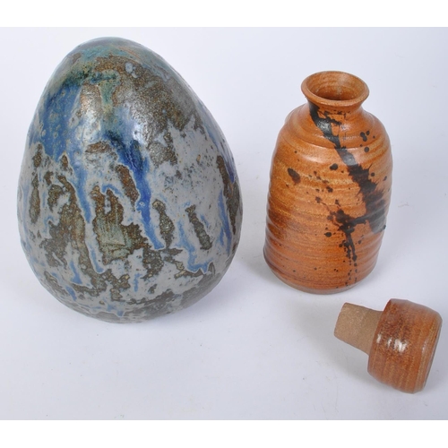 794 - A vintage 20th Century stoneware pottery artwork in the form of an egg. The egg of typical form with... 