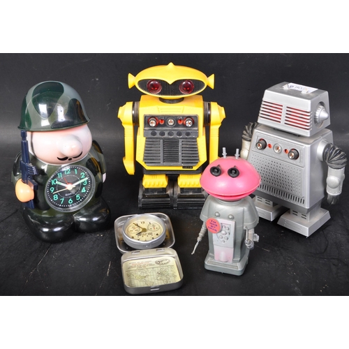 803 - An assortment of retro vintage mid 20th Century Robot radios. Including Star Command i-m-i starriod ... 