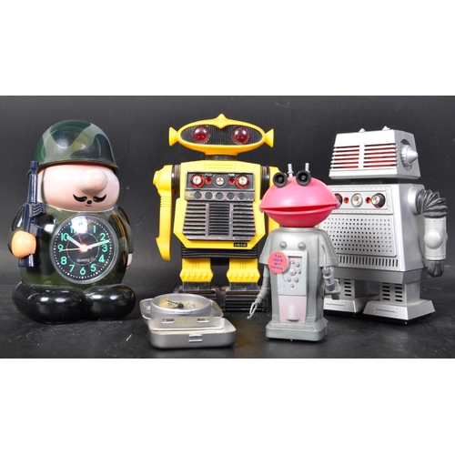 803 - An assortment of retro vintage mid 20th Century Robot radios. Including Star Command i-m-i starriod ... 