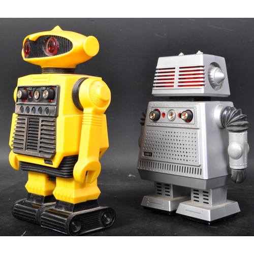 803 - An assortment of retro vintage mid 20th Century Robot radios. Including Star Command i-m-i starriod ... 